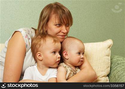 Mother with the children look something interesting