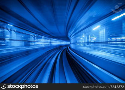 Motion blur of Automatic train moving inside tunnel in Tokyo, Japan.