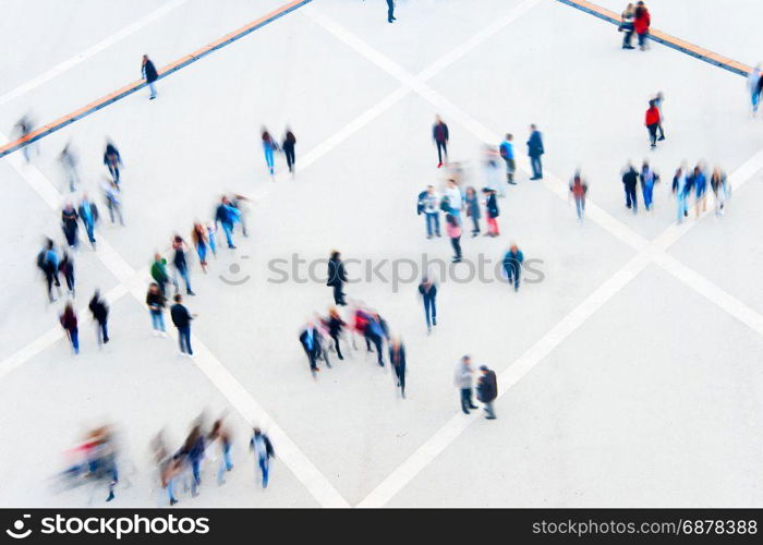 Motion blur of many people. View from above