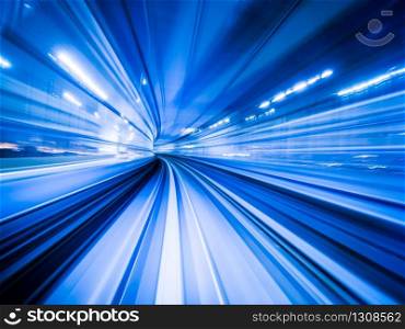 Motion blur train moving in city rail tunnel. Motion blur background abstract.