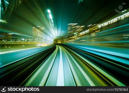 Motion blur train moving in city rail tunnel. Motion blur background abstract.