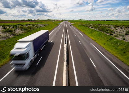 Motion blurred truck on the highway