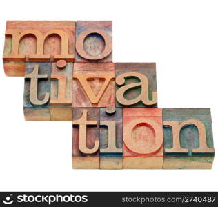 motivation word - isolated abstract in vintage wood letterpress printing blocks