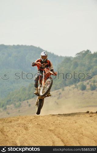 motocross bike in a race representing concept of speed and power in extreme man sport