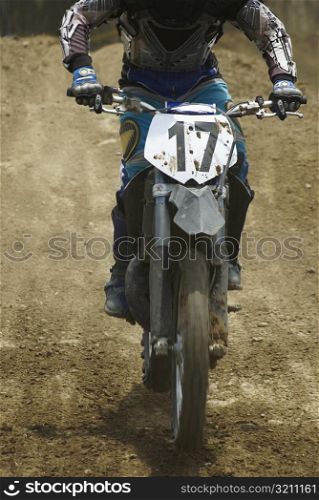 Motocross rider riding a motorcycle
