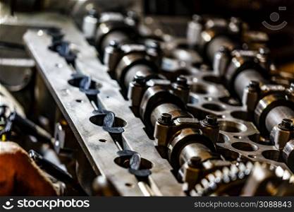 Motor block, engine cylinder head with valves detail. Engine closeup, cylinder head with valves detail