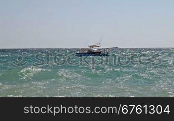 Motor boat on sea waves