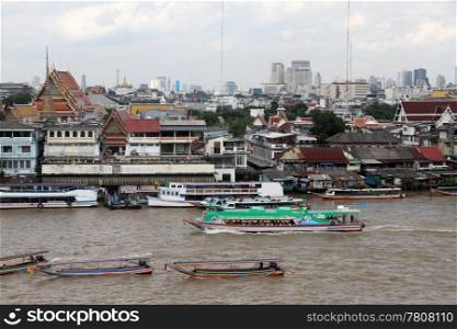 Motor boats on the Chao Phraya river in Bangkok