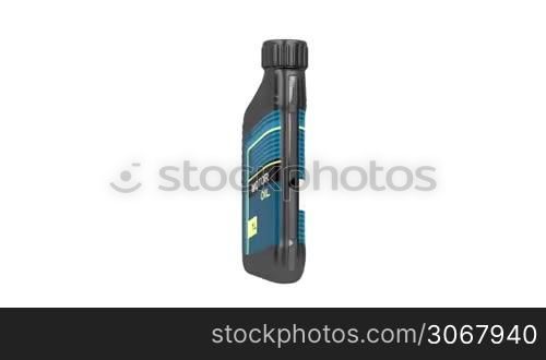 Motor oil bottle rotates on white background