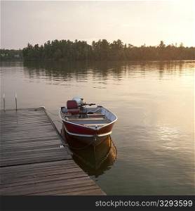 Motorboat at the dock in Lake of the Woods, Ontario
