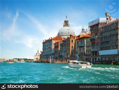 Motorboat near basilica of Santa Maria della Salute in Venice