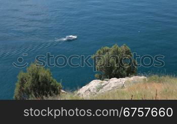 motorboat sailing along the seashore Black Sea, Balaklava, Crimea, Ukraine