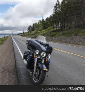 Motorcycle parked on roadside, Irish Cove, Cape Breton Island, Nova Scotia, Canada