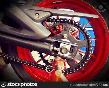 Motorcycle's chain on rear wheel, Maintenance work concept