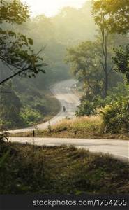 motorcycle travel tour to Rural Country Road on the Mountain at Chiang Rai, Thailand
