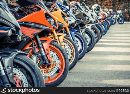 Motorcycles group parking on city street during adventure journey. Motorcyclists community travel concept.