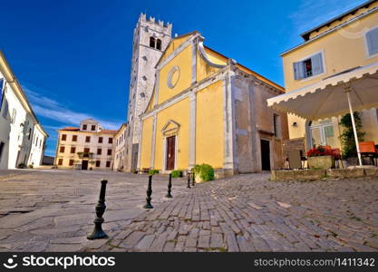 Motovun. Main stone square and church in historic town of Motovun, Istria region of Croatia