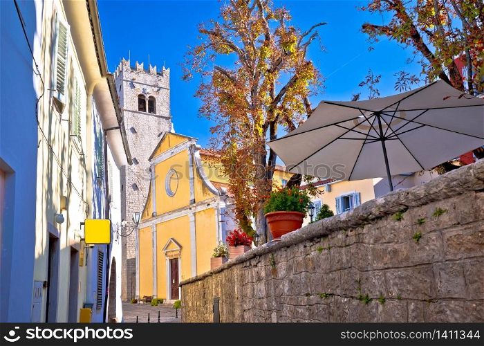 Motovun. Old cobbled street and church in historic town of Motovun, Istria region of Croatia