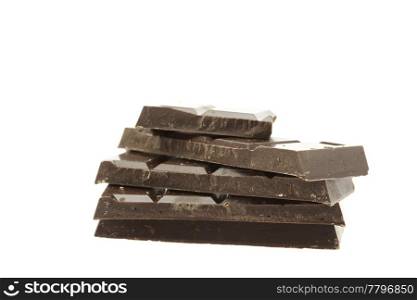 Mount a piece of chocolate isolated on white