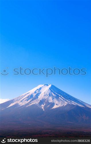 Mount Fuji with snow covered and blue sky in autumn season, clearly seen from Chureito Pagoda Arakurayama Sengen Park in Fujiyoshida near Kawaguchigo