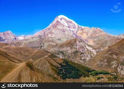 Mount Kazbek close-up view from Stepantsminda in Georgia.