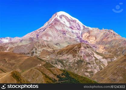 Mount Kazbek close-up view from Stepantsminda in Georgia.