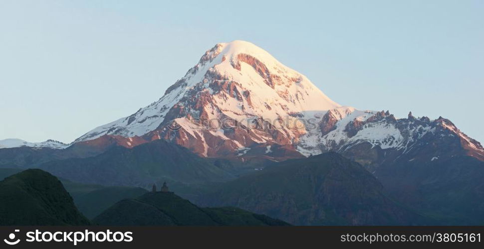 Mount Kazbek in the first light of a day, Caucasus Mountains, Georgia, Europe