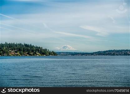 Mount Rainier can be seen in the distance with Lake Washington in the foregrund. Mercer Island is on the left. Shot taken at Seward Park.