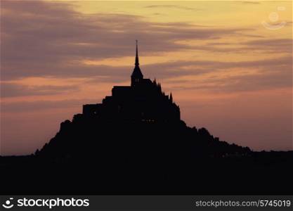 mount saint michel at sunset, brittany, france