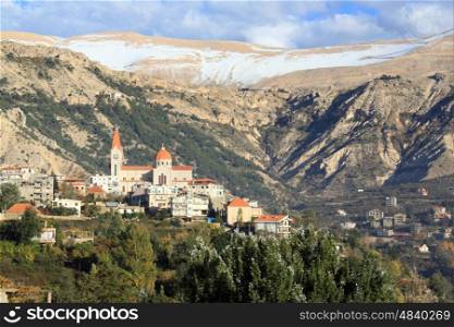 Mount, snow and town Bcharre in Lebanon