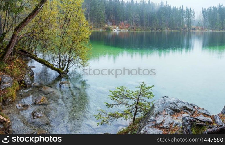 Mountain alpine autumn lake Hintersee, Berchtesgaden national park, Deutschland, Alps, Bavaria, Germany. Picturesque traveling, seasonal and nature beauty concept scene.