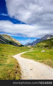 Mountain and hiking path landscape in Pralognan la Vanoise national park. French alps. Mountain and hiking path landscape in French alps