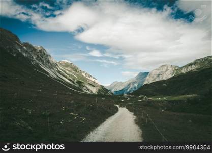Mountain and hiking path landscape in Pralognan la Vanoise national park. French alps. Mountain and hiking path landscape in French alps