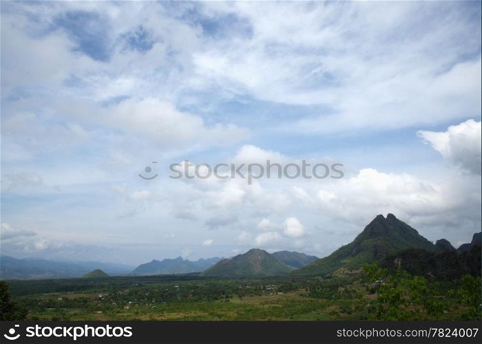 Mountain and sky. Mountain complex and the sky covered with clouds.