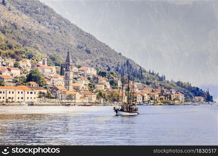 mountain architectural landscape, view from the sea to the village of Perast, Montenegro