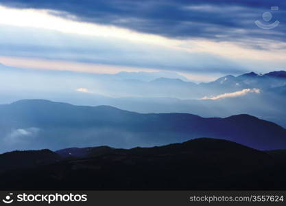 Mountain area at sunrise in Yunnan province, China