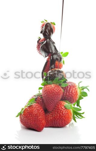 Mountain big juicy strawberries in chocolate isolated on white