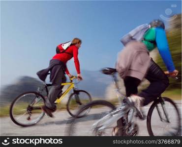 mountain bike men with blue sky riding on outdoor trail in nature