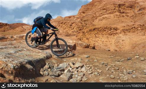Mountain Biker Riding in the Negev Desert.