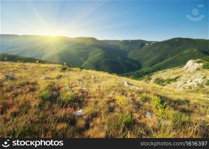 Mountain hill during sunrise. Natural spring landscape