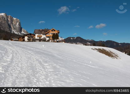 Mountain Hut and Ski Slope Landscape in Sunny Day.. Mountain Hut and Ski Slope Landscape in Sunny Day