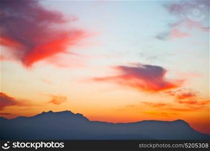 mountain in morocco africa lans and red sunrise