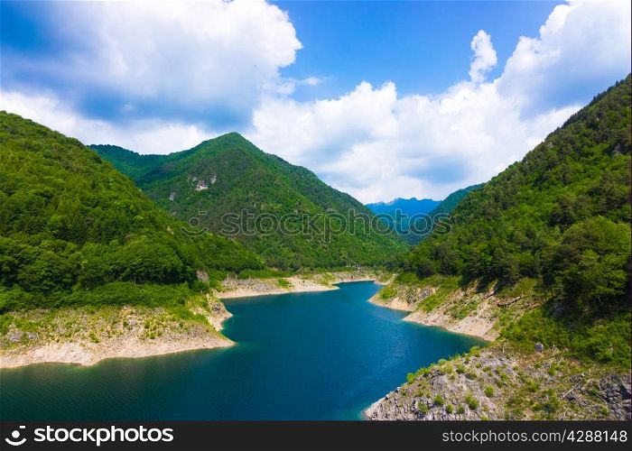 Mountain lake. Beautiful landscape with lake, forest and mountains