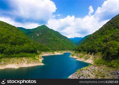 Mountain lake. Beautiful landscape with lake, forest and mountains