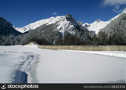Mountain lake in the snow