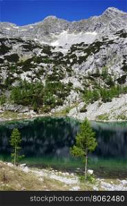 Mountain lake near Triglav mount in Slovenian Alps
