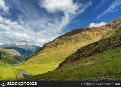 Mountain landscape along the road to Stelvio pass, Sondrio province, Lombardy, Italy, at summer.