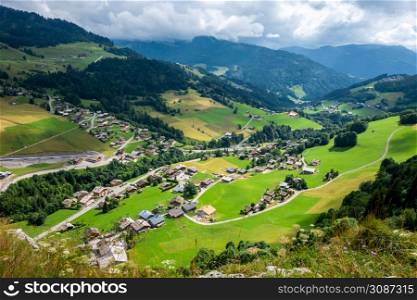 Mountain landscape and Chinaillon village. The Grand-Bornand, Haute-savoie, France. Mountain landscape and Chinaillon village, The Grand-Bornand, France