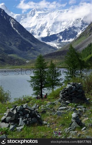 Mountain landscape. Highlands, the mountain peaks, gorges and valleys. The stones on the slopes. Mountain landscape. Highlands, the mountain peaks, gorges and valleys. The stones on the slopes.