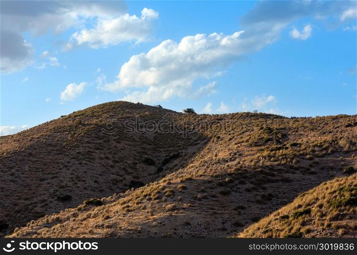 Mountain landscape in hills not far from Mazarron (Murcia, Spain) in last evening sunlight.